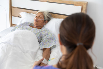 nurses check up on inpatient health elderly