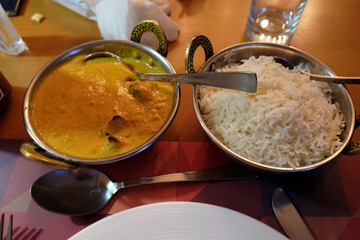Chicken tika masala with white rice in One Step Up restaurant in Kolkata, West Bengal, India 