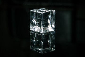 One Ice cube on Black Background