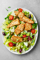 Chicken salad with vegetables and olives