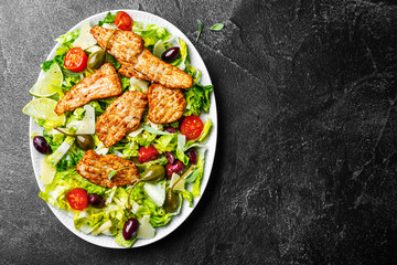 Chicken salad with vegetables and olives