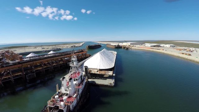 Aerial shot of a boat transporting salt, Ojo de Liebre lagoon, Biosphere Reserve of El Vizcaino, Baja California Sur
