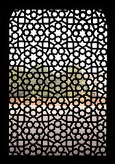 Intricate carving of stone window grill at Humayun's Tomb, built by Hamida Banu Begun in 1565-72, Delhi, India