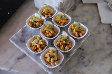 Tray of appetizers. finger food serve on platter. Various banquet snacks prepare for event party at luxury hotel Four Points by Sheraton Agra, Uttar Pradesh, India 
