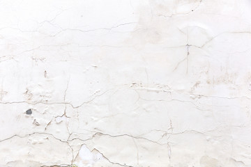 Wall with crumbling plaster