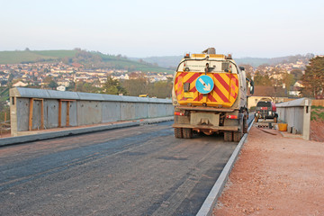 Truck on a road bridge construction site