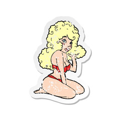 retro distressed sticker of a cartoon pin up girl