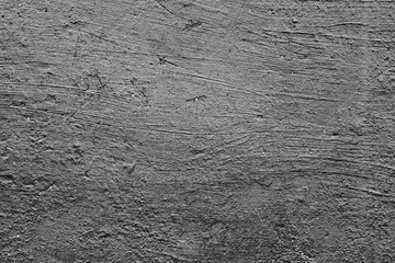 Wall fragment with scratches and cracks