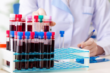 Young female chemist working in the lab 