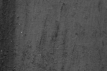 Wall fragment with scratches and cracks