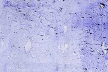 Wall fragment with scratches and cracks