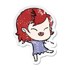 distressed sticker of a cartoon laughing vampire girl