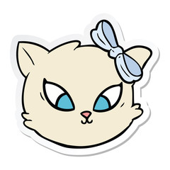 sticker of a cute cartoon cat with bow