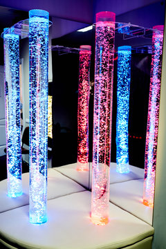 therapy sensory stimulating multi sensory room with colored lights bubble tube lamp during therapy session