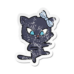distressed sticker of a cartoon cat