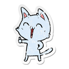 distressed sticker of a happy cartoon cat