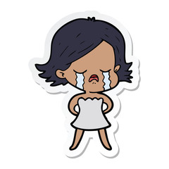 sticker of a cartoon girl crying