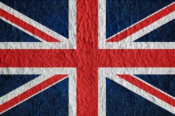 British flag on concrete surface. Creative wallpaper for installation and design.