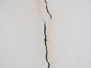 crack in the wall inside the room.