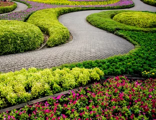 Foto auf Leinwand Luxuriöse Landschaftsgestaltung des tropischen Gartens. Schöne Aussicht auf tropische Landschaft © romaset