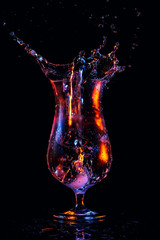 Water splash in a cocktail glass