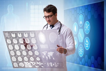 Doctor in telemedicine concept looking at x-ray image