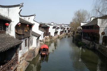 Fototapeta premium Traditional houses along the Grand Canal, ancient town of Yuehe in Jiaxing, Zhejiang Province, China