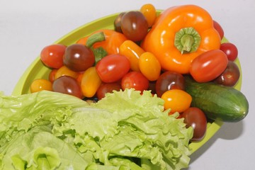  fresh vegetables for salad on a plate
