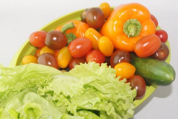  fresh tomatoes, lettuce, bell peppers and cucumber for vegetable salad