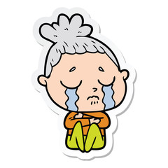 sticker of a cartoon crying woman hugged up