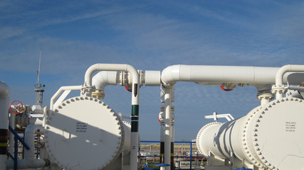 Heat exchangers for heating of oil