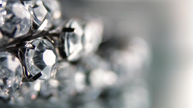 RACK FOCUS Diamond bracelet against neutral background in 4K
