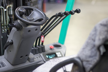 steering and cab of forklift with levers. in stock
