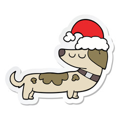 sticker of a cartoon dog wearing christmas hat