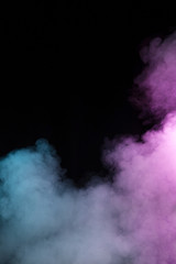Fototapeta na wymiar Colorful smoke on black background