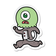 sticker of a cartoon cyclops alien spaceman running