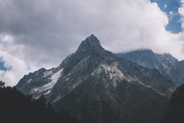 Panorama view on mountains scene in national park of Dombay, Caucasus