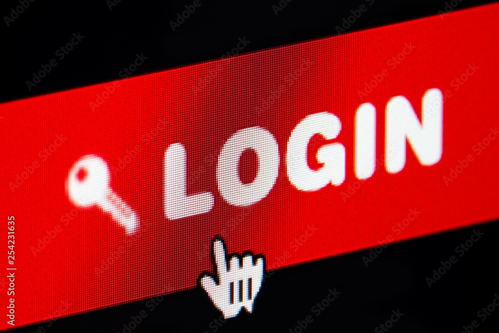 Wall mural login button of a membership website being clicked. close up of a computer screen.