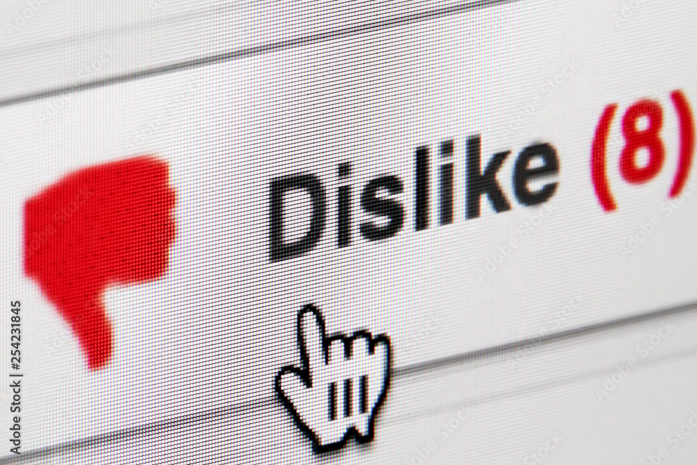 Poster computer screen with dislike button being clicked.