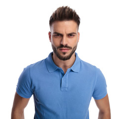 Fototapeta premium Young man frowning in front of the camera