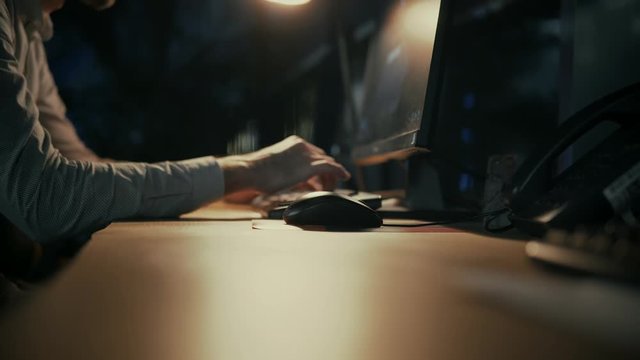 Overtime Work In Office.Man Working On Modern Office At Night.Overworked Businessman Working Late At Night, Alone In The Office.Exhausted Businessman Working Late At The Office.Man Working Late Night.