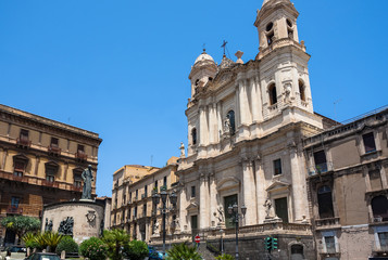 Fototapeta na wymiar Catania church Santo Francesco and the statue of Cardinale Dusmet