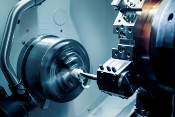 CNC lathe machine (Turning machine). Hi-precision CNC machining concept.