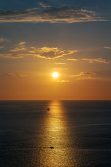  Boats sailing under Phuket sunset