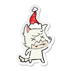 distressed sticker cartoon of a dead fox wearing santa hat