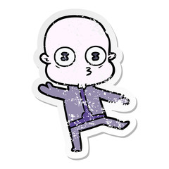 distressed sticker of a cartoon weird bald spaceman dancing
