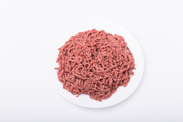 Food, national cuisine and delicious concept - isolated raw minced beef