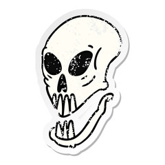 distressed sticker cartoon doodle of a skull head