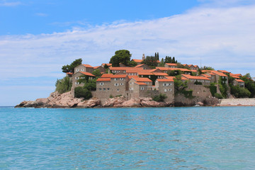 Fototapeta na wymiar Sveti Stefan island in a beautiful summer day, Montenegro