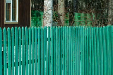 Fototapeta premium Wooden painted in green fence